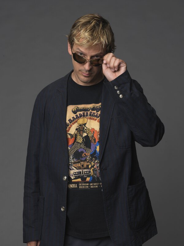 man in blazer and sunglasses