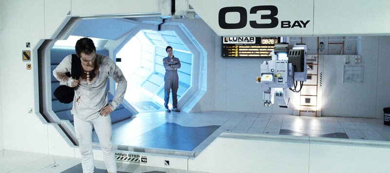 Man in blood-stained clothes on spaceship
