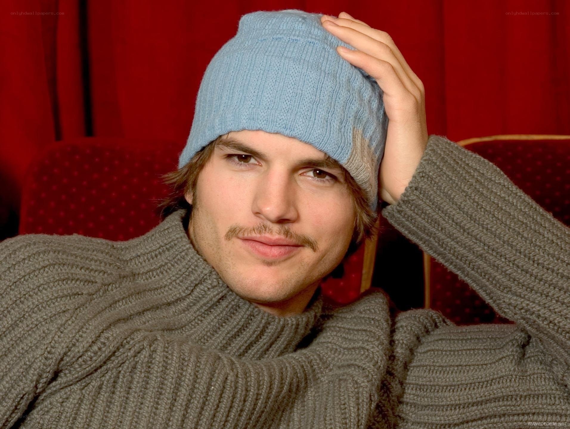 man in blue beanie and sweater
