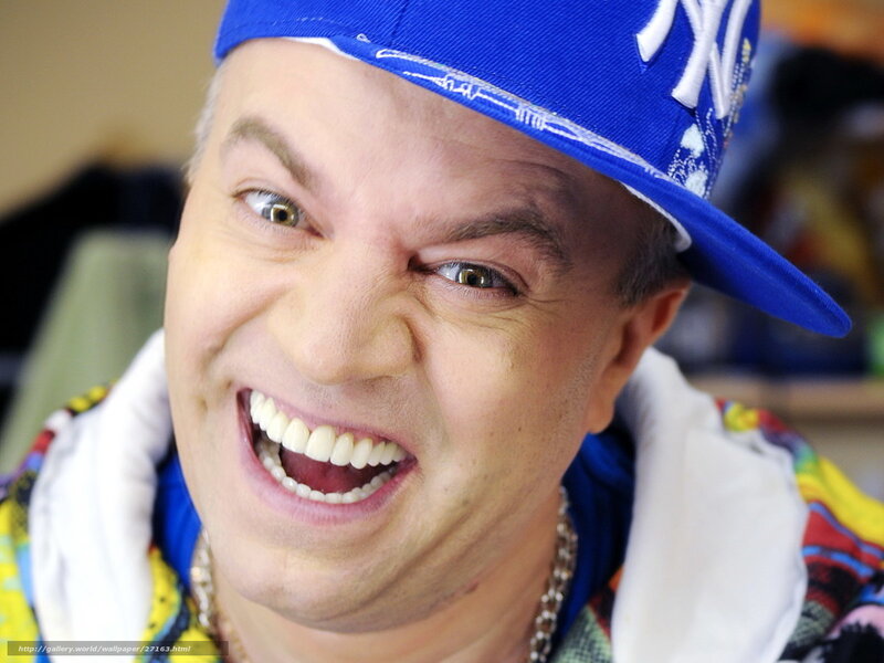 man in blue cap smiling