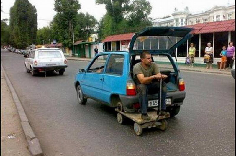 Man in Blue Car