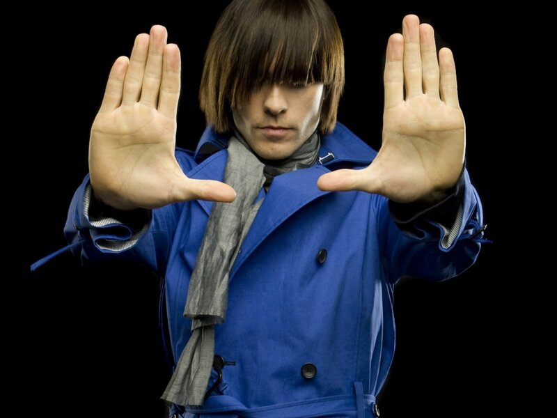 Man in Blue Coat