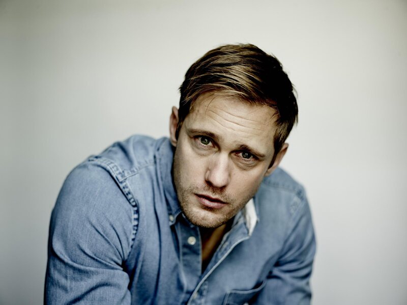 man in blue denim shirt