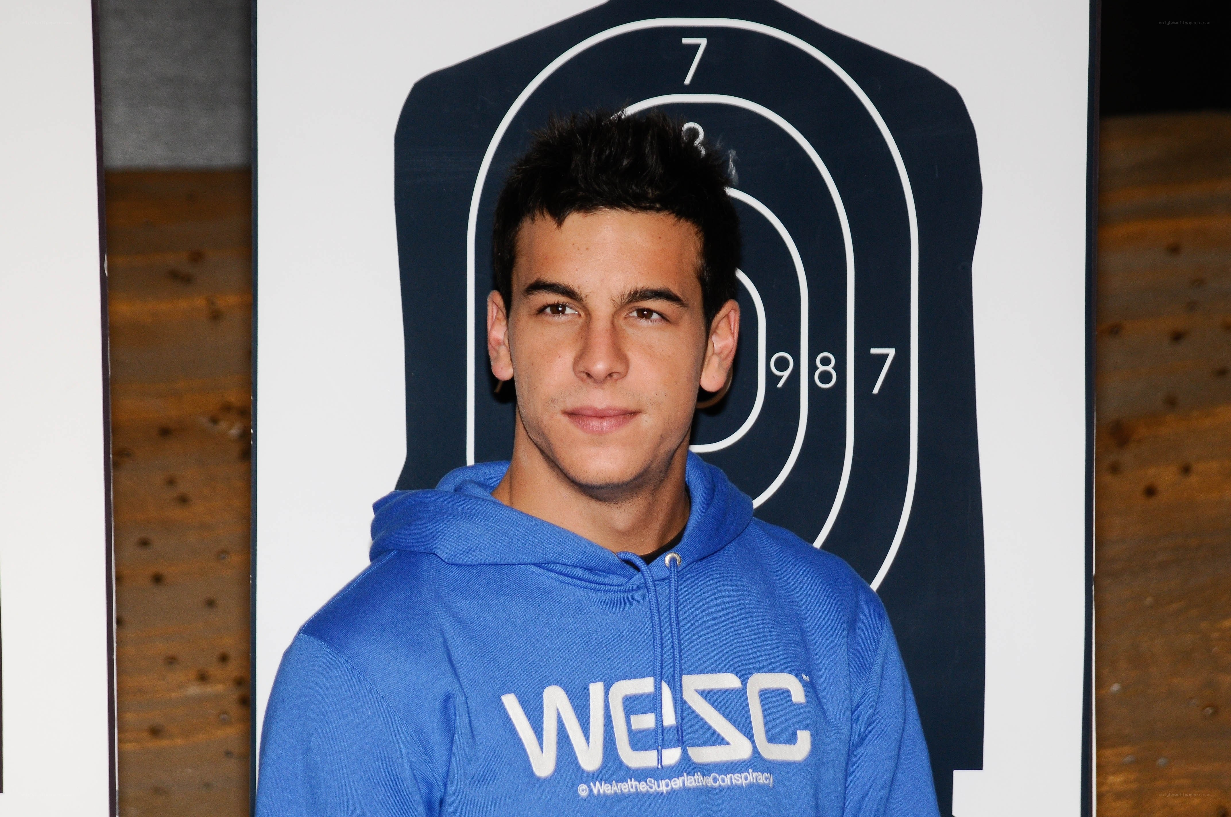 man in blue hoodie