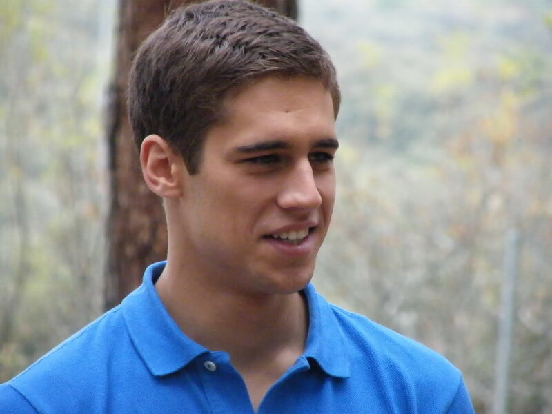 man in blue polo shirt