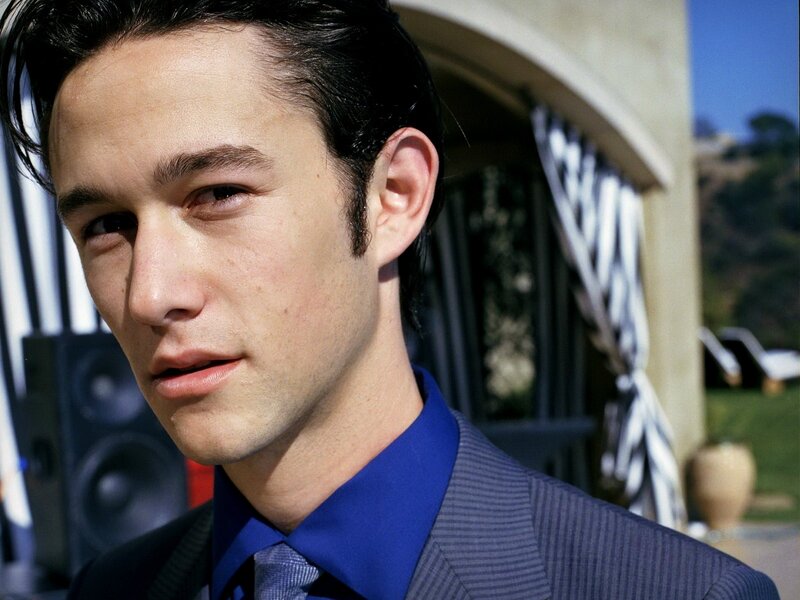 man in blue shirt and suit