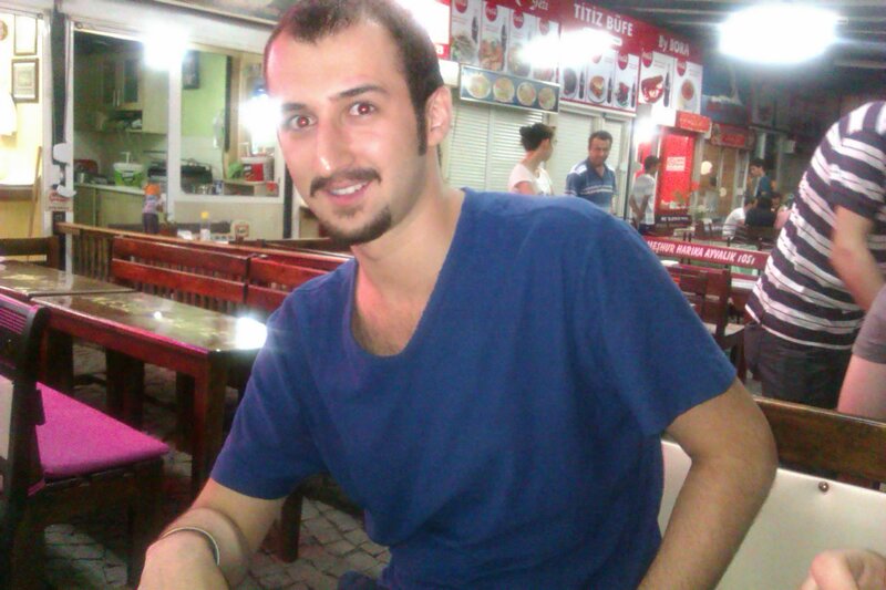 Man in blue shirt at restaurant