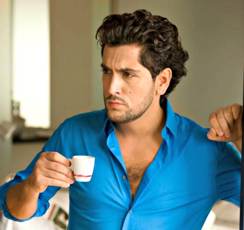 Man in Blue Shirt — Contemplative