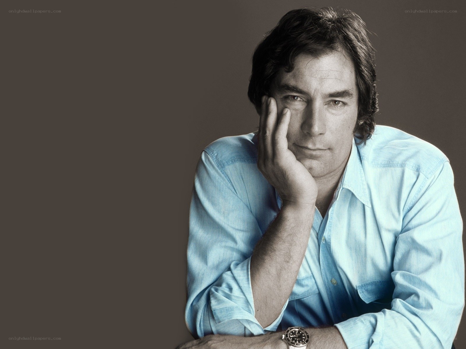 man in blue shirt portrait