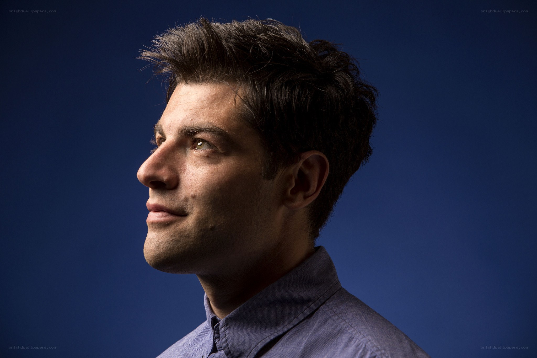 man in blue shirt profile
