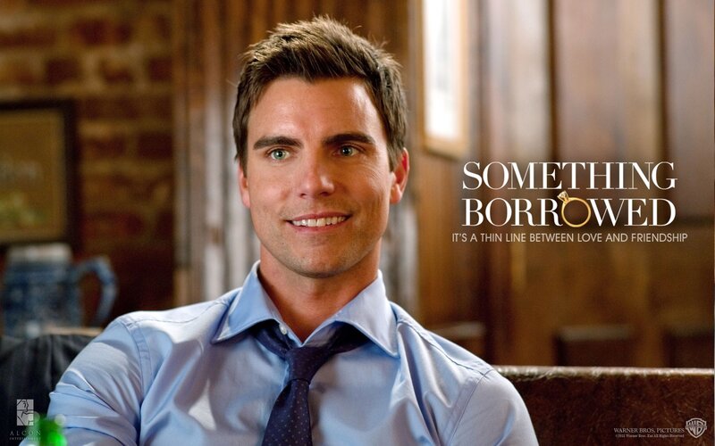 man in blue shirt smiling