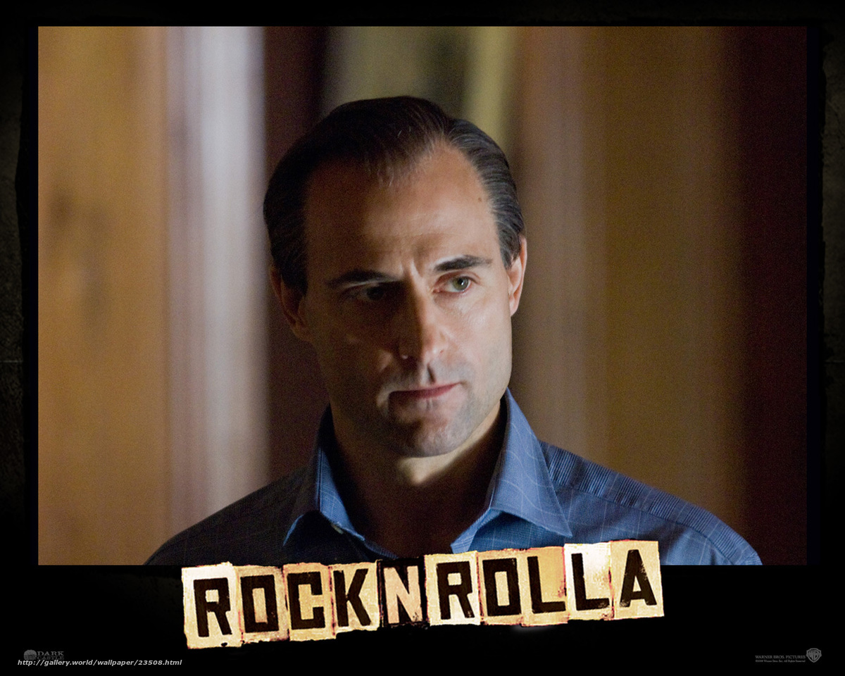 Man in blue shirt with RocknRolla title