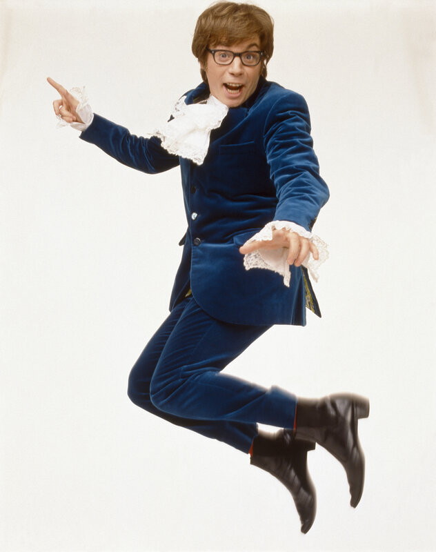 Man in blue suit jumping