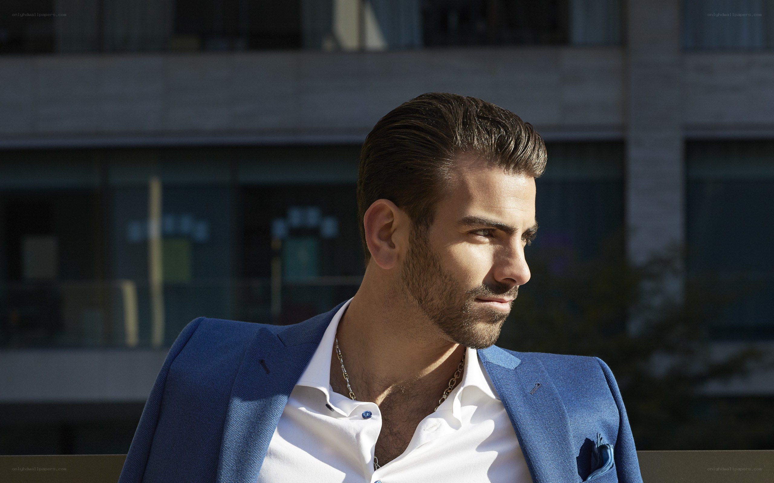 man in blue suit outdoors