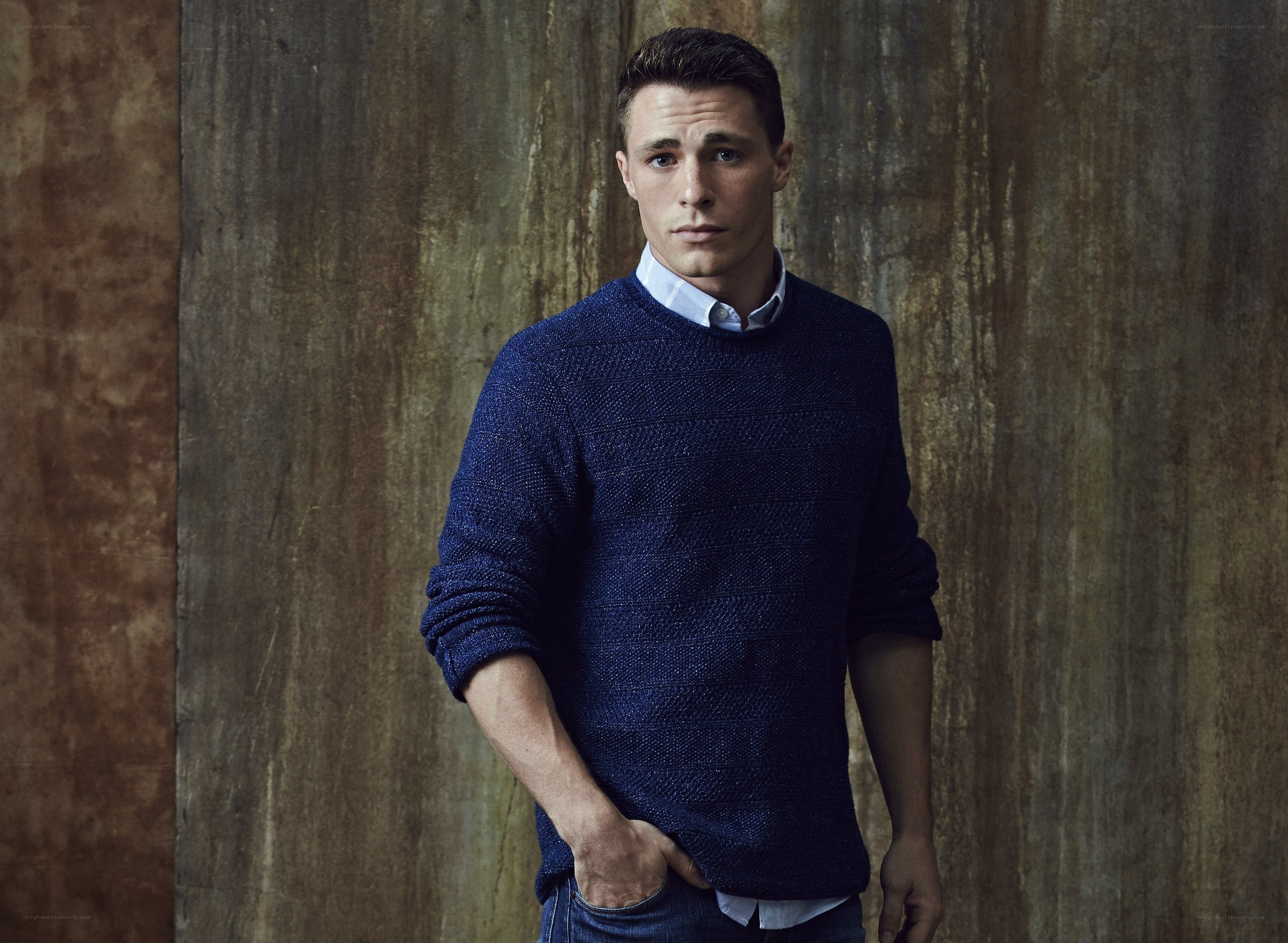 man in blue sweater