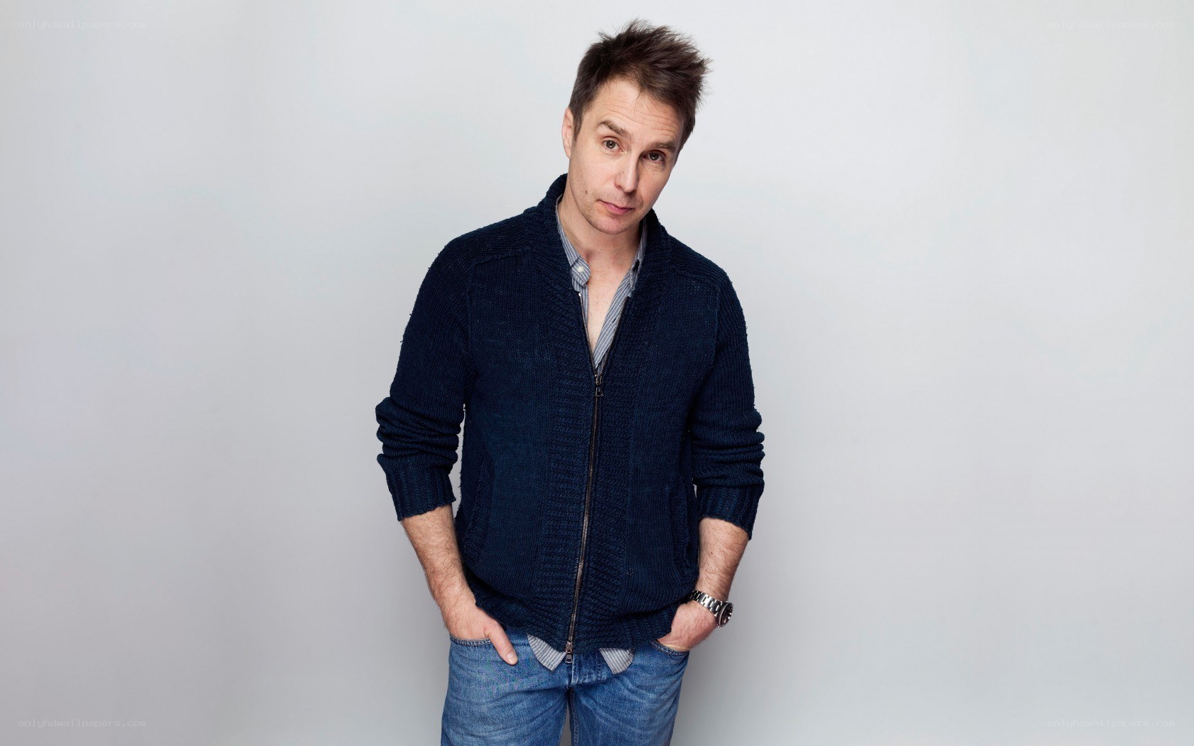 man in blue sweater