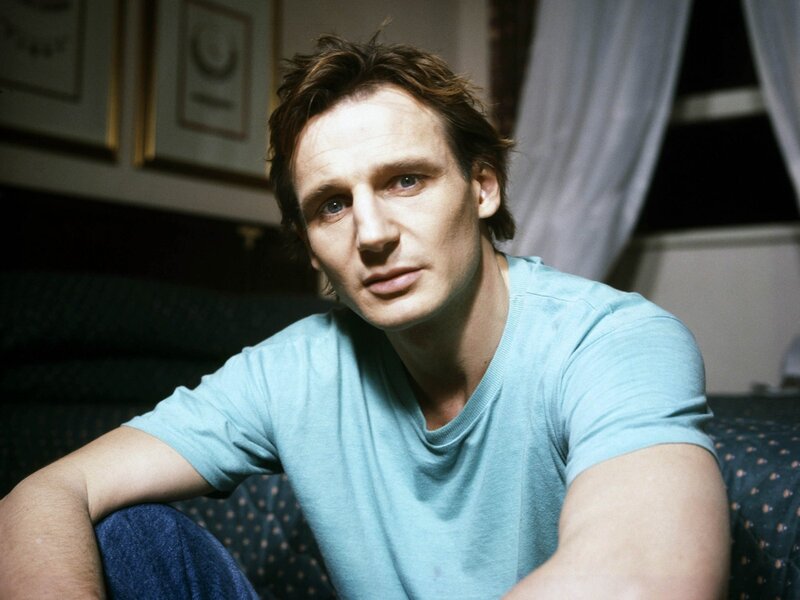 Man in Blue T-shirt — Neutral, Photograph, Couch