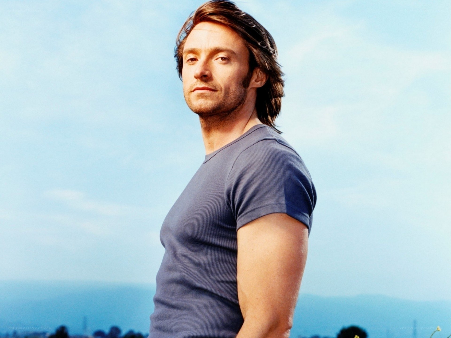 man in blue t-shirt outdoors