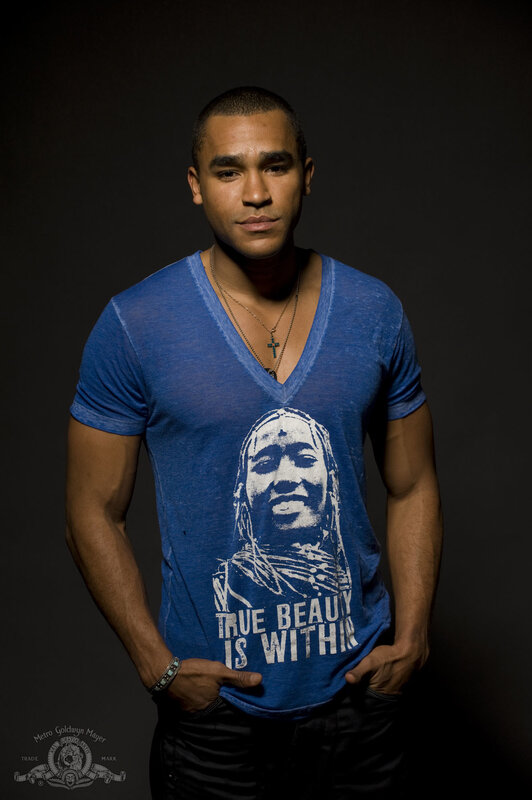 man in blue t-shirt with graphic