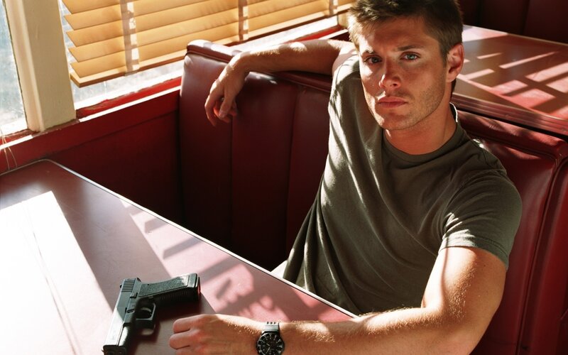 Man in Booth with Gun