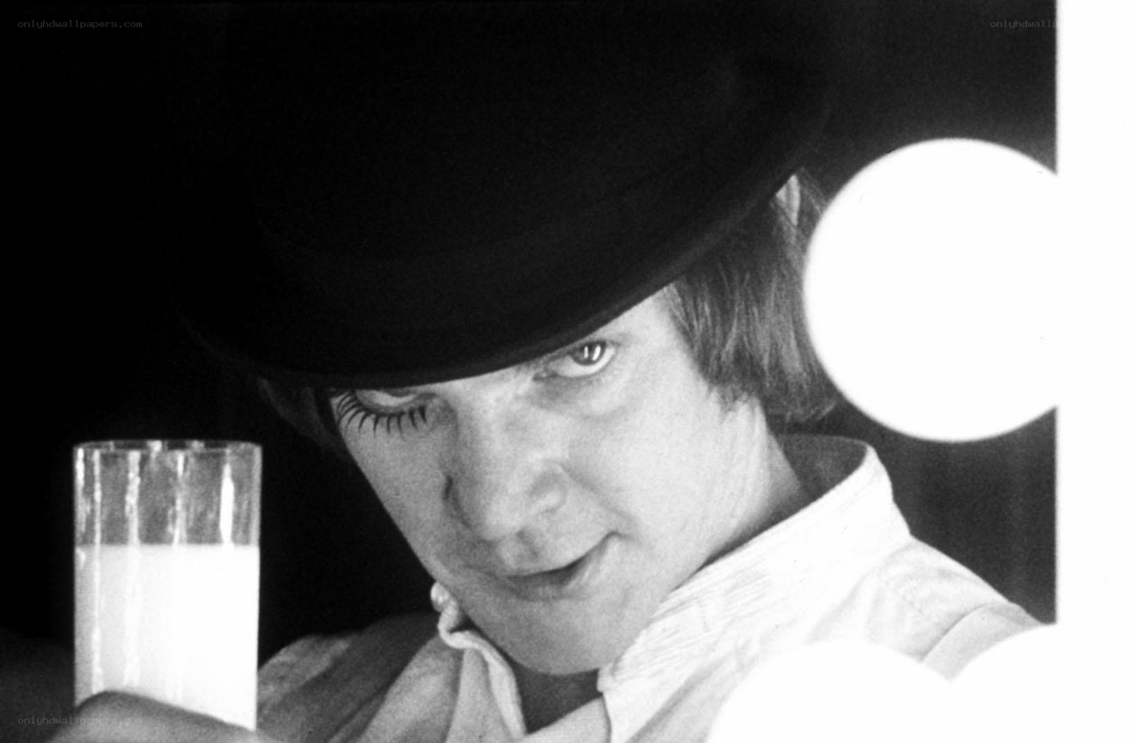 man in bowler hat with milk