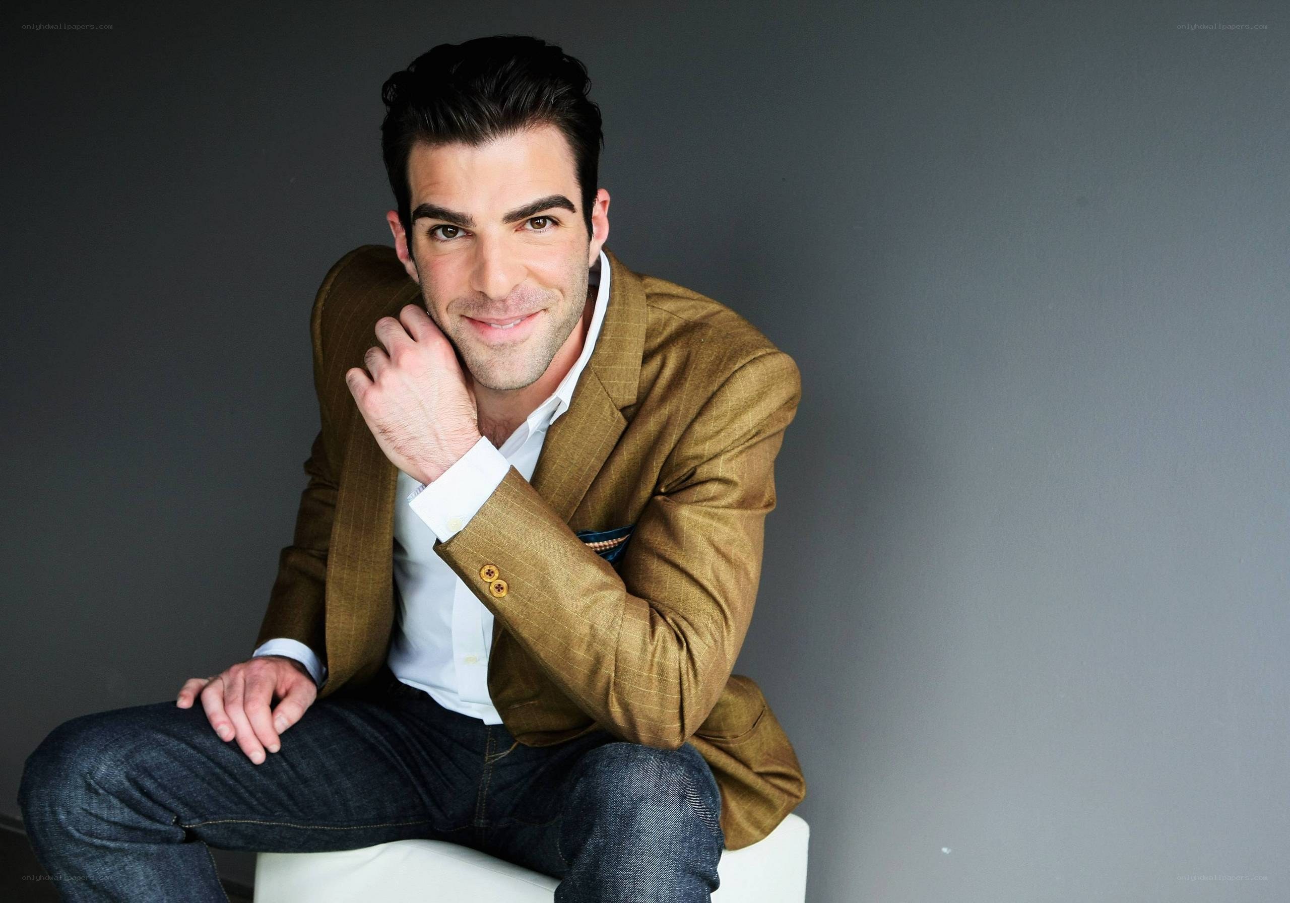 man in brown blazer