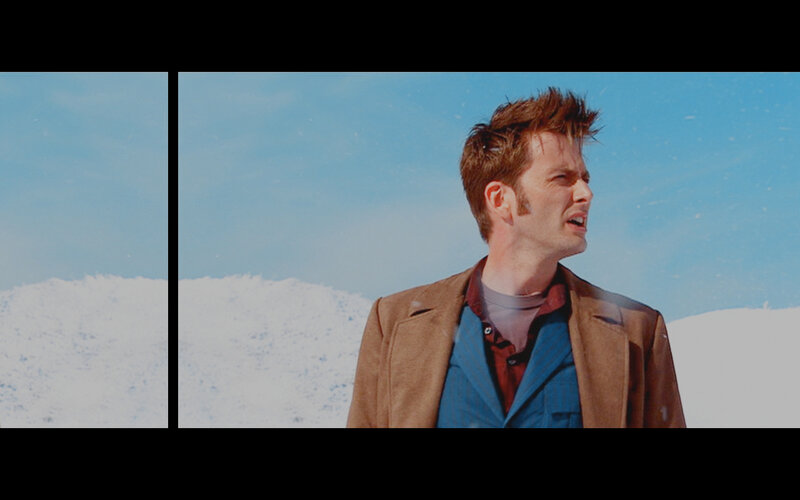man in brown coat on snowy hill