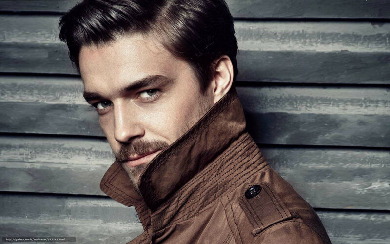 man in brown jacket