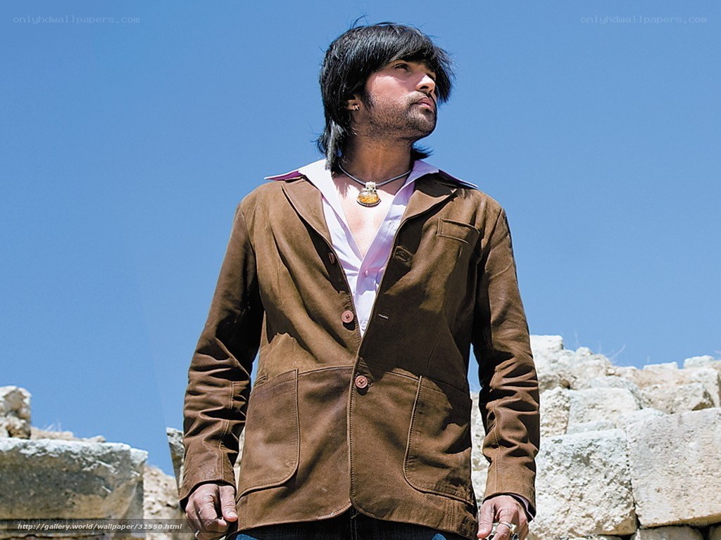 Man in brown jacket outdoors