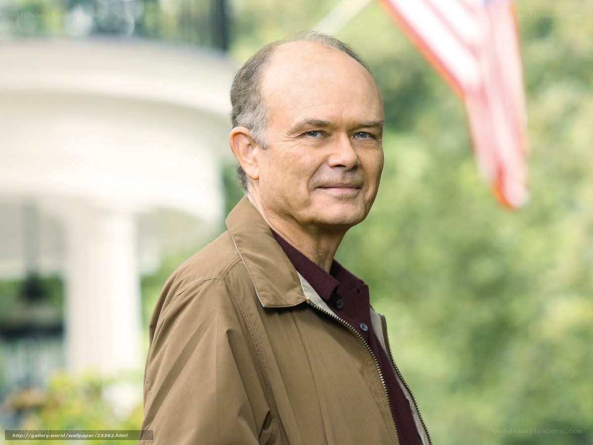 man in brown jacket outdoors