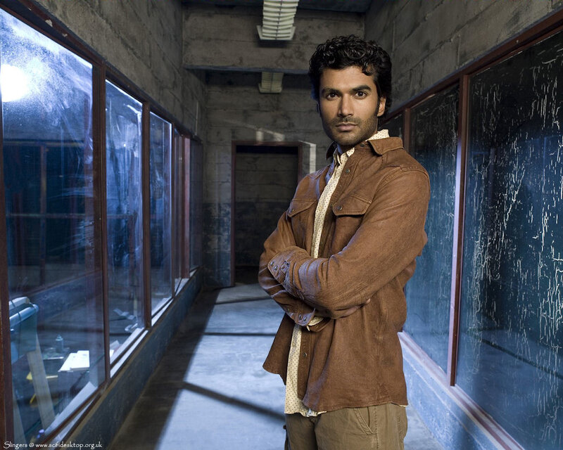 Man in Brown Jacket — Serious, Photograph, Concrete Hallway, Windows