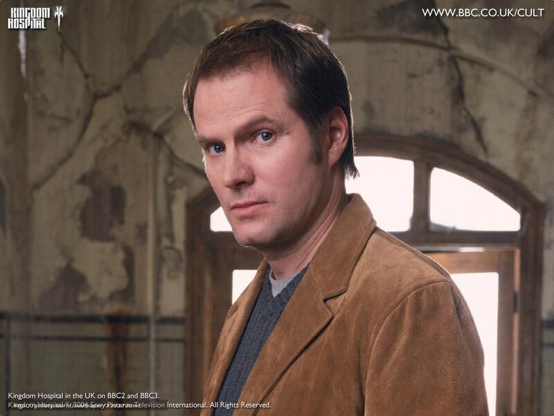 Man in Brown Jacket — Serious, Photograph, Window