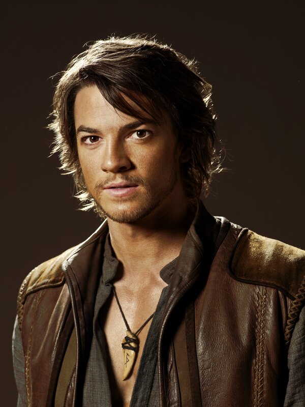 man in brown leather jacket