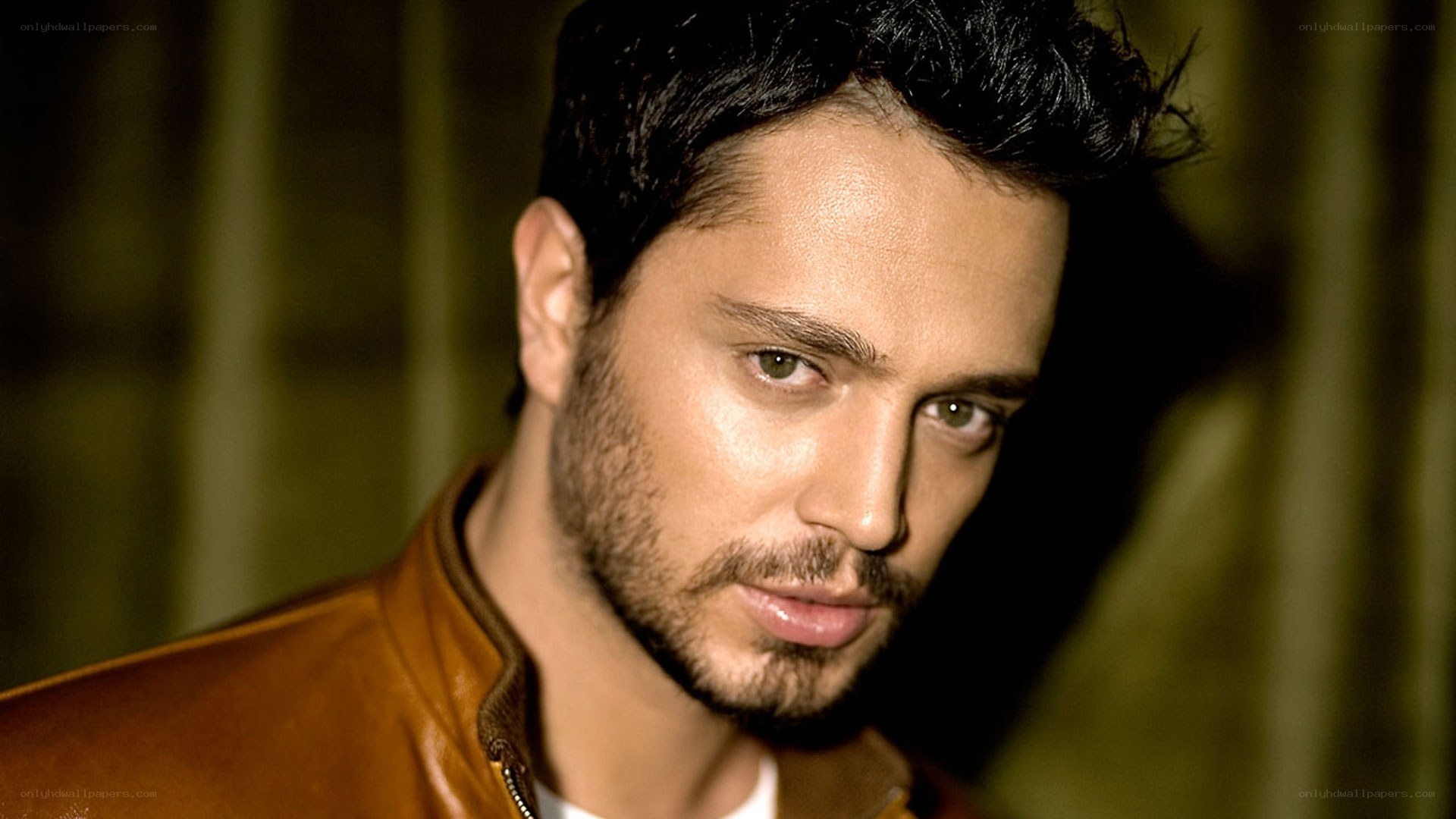 man in brown leather jacket
