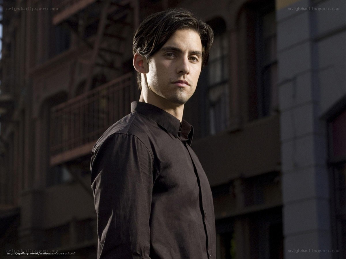 man in brown shirt on street