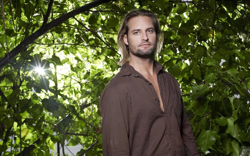 man in brown shirt outdoors