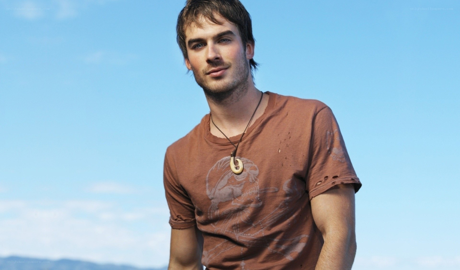 man in brown t-shirt