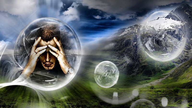man in bubble with mountains