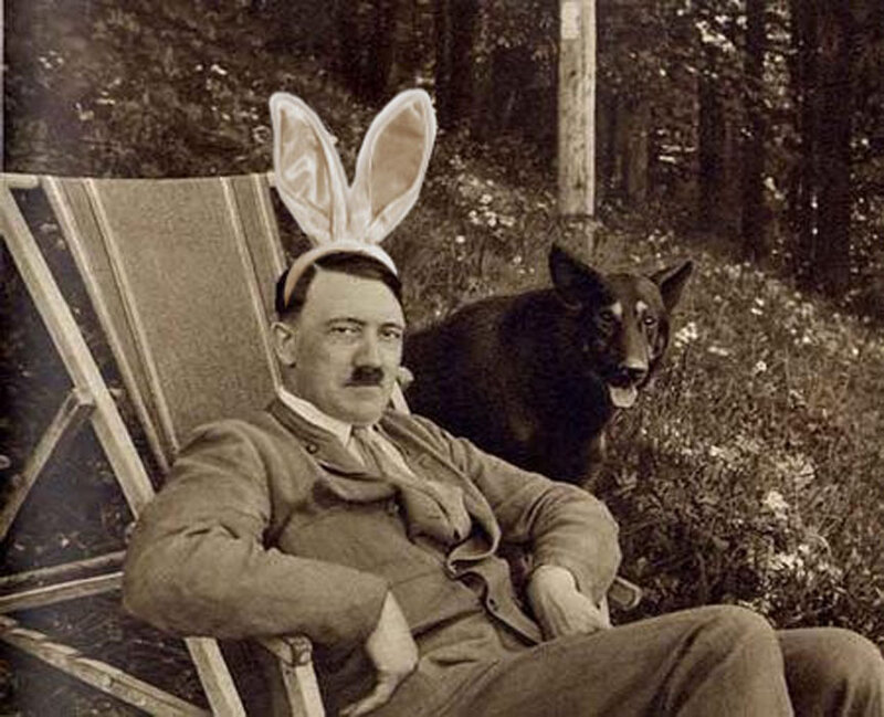 Man in bunny ears with dog