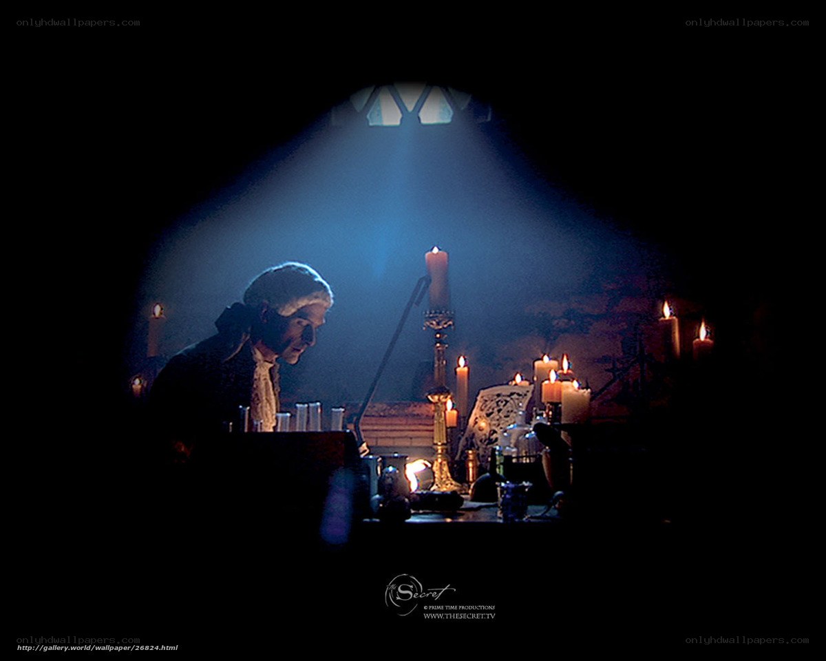 man in candlelit study
