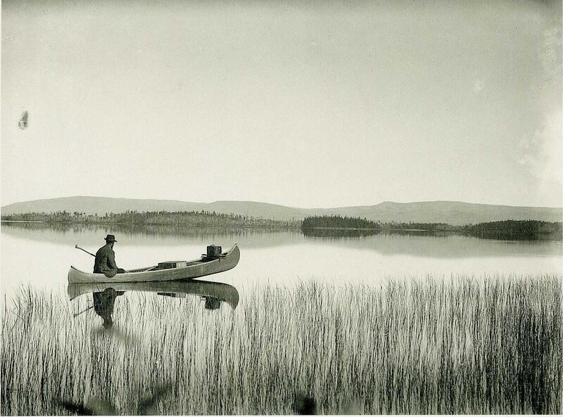 Man in canoe on a lake