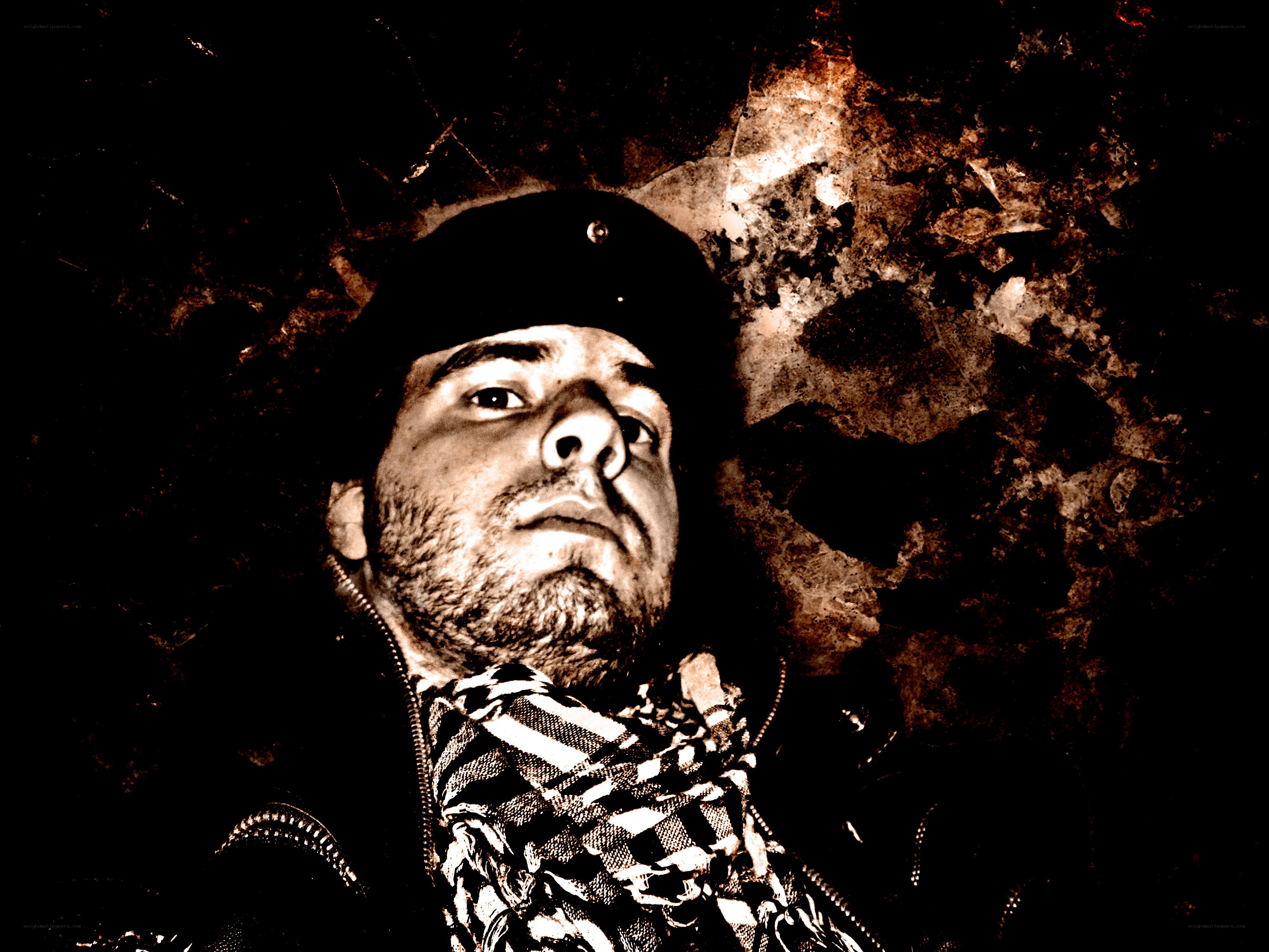 man in cap and scarf