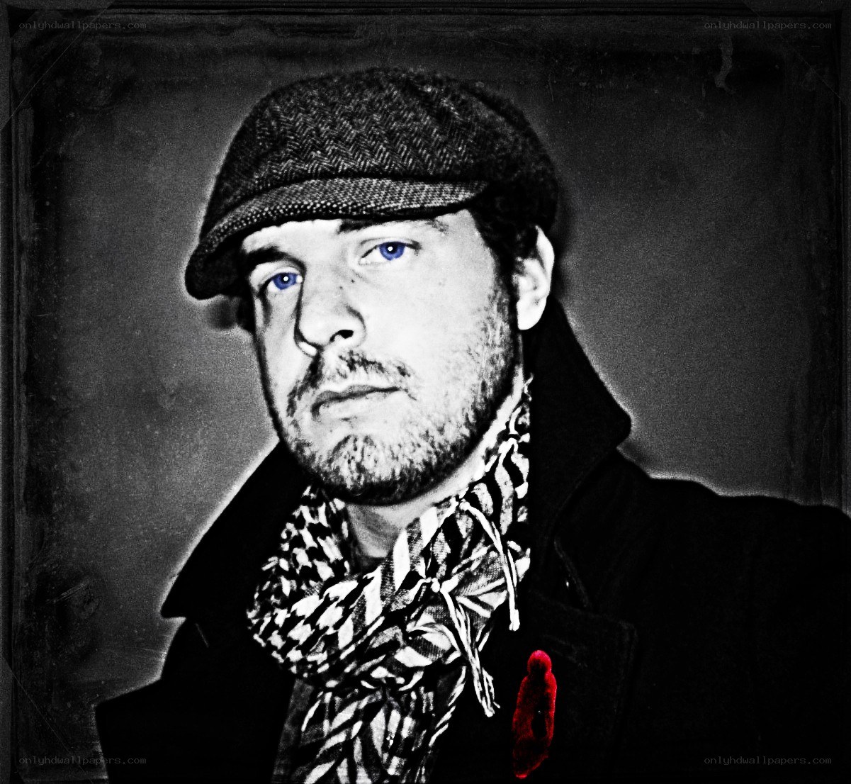 man in cap and scarf