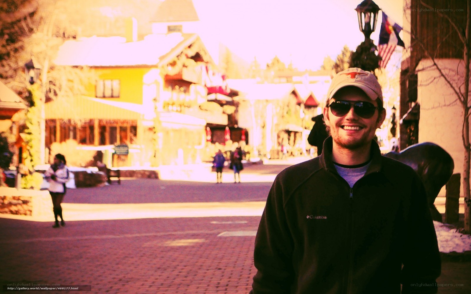 man in cap and sunglasses