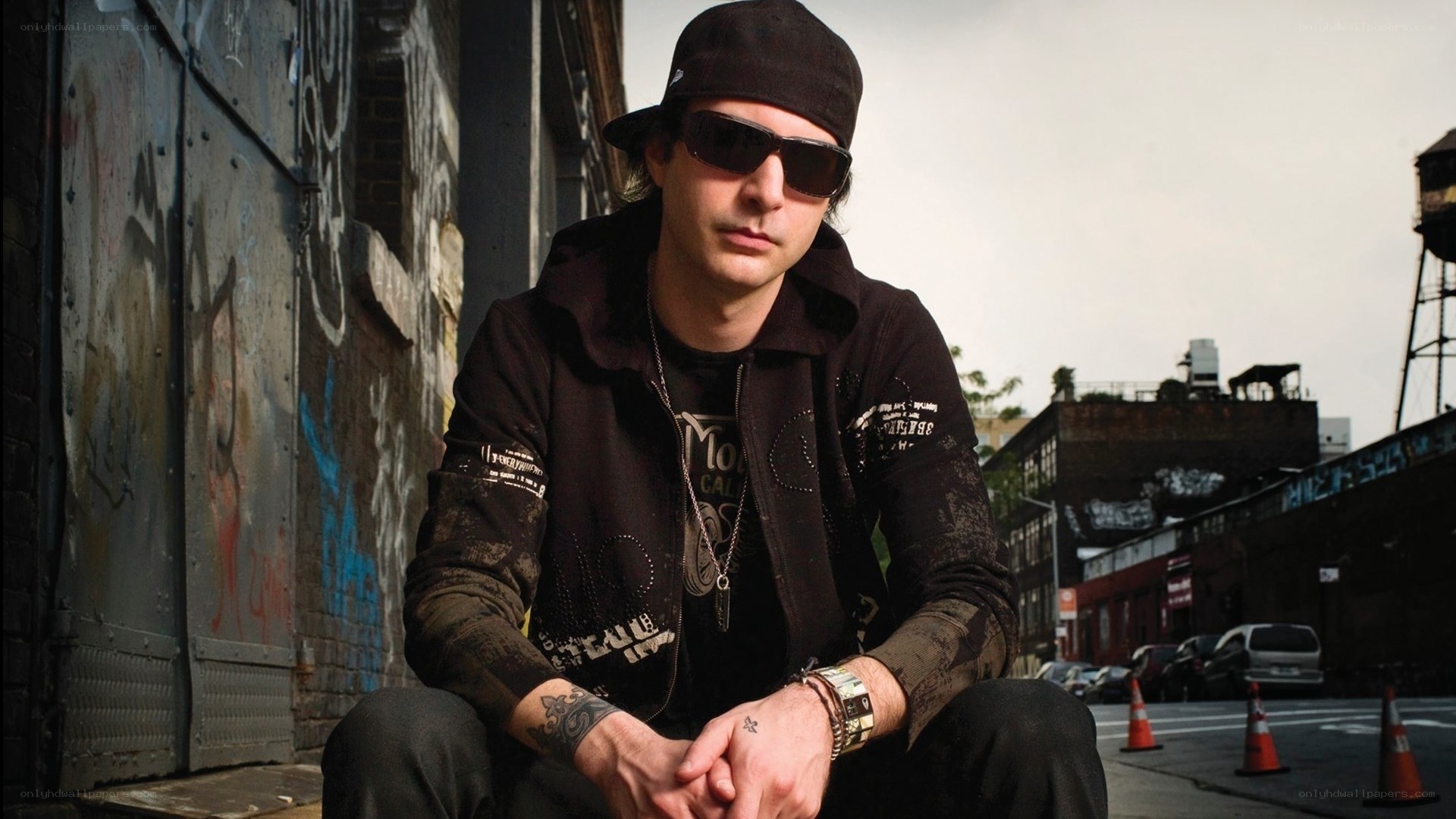 man in cap and sunglasses
