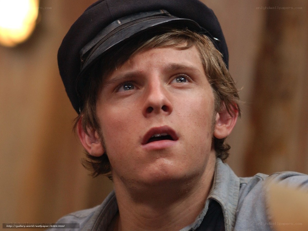 man in cap looking up