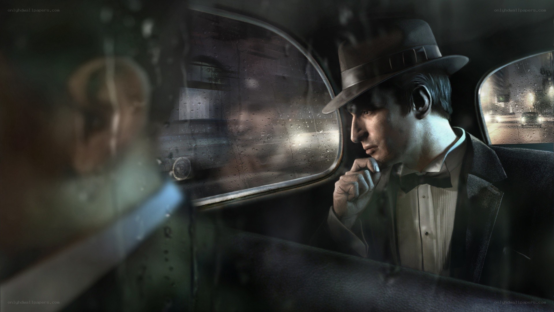 man in car at night