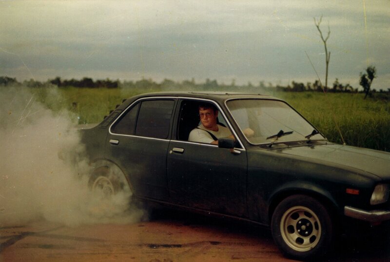 Man in car doing burnout