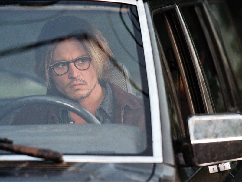 Man in Car — Gray, Serious