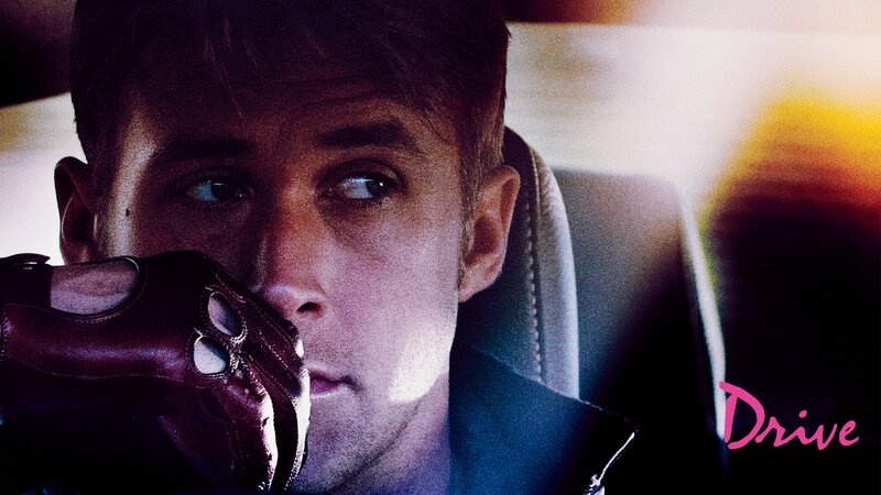 Man in Car Holding Shoe